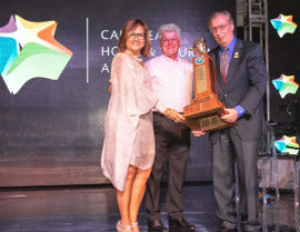 Caribbean Hotelier of the Year Leo Garbutt is flanked by CHTA President Patricia Affonso-Dass and Frank Comito, CHTA CEO and Director General.