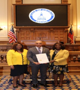 Jamaica’s Ambassador to the United States, Major General (Ret’d) Antony Anderson (center), receives a Georgia State Senate resolution presented by State Senator Tonya Anderson during a brief ceremony at the State Capitol on May 4, 2026. Ambassador Anderson was recognized for his diplomatic leadership and commitment to strengthening international cooperation. At left is Jamaica’s Honorary Consul in Atlanta, Elaine Grant Bryan. (Photo by Derrick Scott)