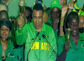 Prime Minister Andrew Holness ringing the bell as he names September 3 as the date for the general elections in Jamaica (CMC Photo)