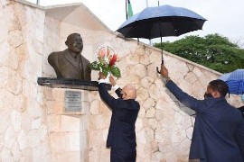  Governor-General, His Excellency the Most Hon. Sir Patrick Allen, places flowers at the shrine of Jamaica’s first National Hero, the Right Excellent Marcus Garvey, to commemorate the 134th anniversary of his birth on Tuesday, August 17, at National Heroes Park in Kingston. 