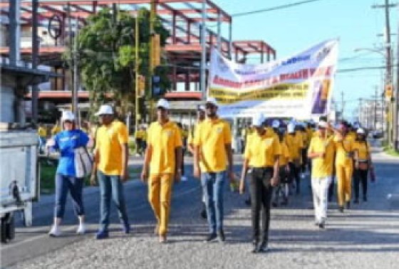 Minister of Labour Joseph Hamilton participates in the Occupational Safety and Health Day walk