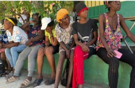 Haitians awaiting food outside a relief area