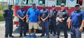 Comm. “Jabbow” with both Lauderhill and Bahamian Firefighters after training on the Ladder Trucks.