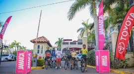 Discover Jamaica by Bike participants pause for a photo before leaving Spanish Court Hotel
