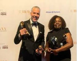Philip Rose, Regional Director, Northeast USA, Jamaica Tourist Board (JTB) and Marcia Sinclair, District Sales Manager (JTB), Northeast USA, celebrate Jamaica’s triple wins at the Travvy Awards in New York
