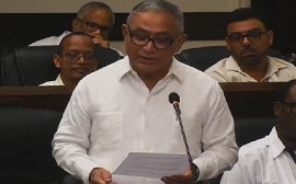 Prime Minister John Briceño addressing a joint sitting of Parliament in honour of the state visit of Guyana President Dr. Irfaan Ali (CMC Photo)