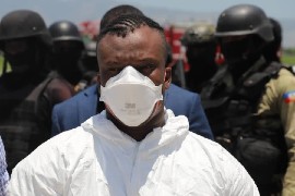 Gang leader Germine Joly being extradited on Tuesday.