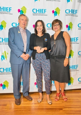 CHTA CEO Frank Comito (left) and CHTA President Patricia Affonso-Dass (right) congratulate Marie Fielden of True Blue Bay Resort and Villas in Grenada, who were 2018 finalists.