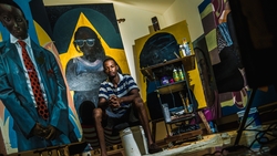 Artist Kimani Beckford in studio, surrounded by the pieces of his upcoming first solo exhibition entitled Affirmation.