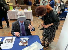  Greater Miami Convention and Visitors Bureau President and CEO Bill Talbert tries out the virtual reality experience