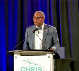 Governor Albert Bryan Jr. addresses CHRIS delegates in Miami.  