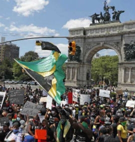 The Jamaican flag was prominent at Brooklyn, New York protest.