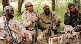 Fighters from T&T in military training in Syria. Photograph by The Guardian