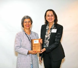 CCI Envoy Karolin Troubetzkoy (right) congratulates Josefina Gomez of Fondo MARENA in the Dominican Republic  (The National Fund for the Environment and Natural Resources) while in Antigua last week.