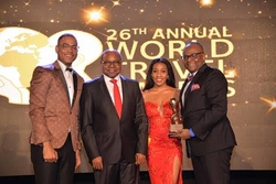 Minister of Tourism, Hon Edmund Bartlett (left) and Director of Tourism, Donovan White accept Caribbean’s Leading Tourist Board award at the 26th Annual World Travel Awards during the Caribbean & North America Gala Ceremony held at Sandals Montego Bay.