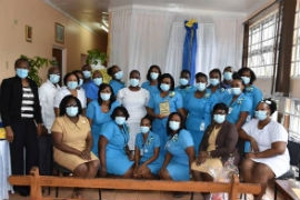 Parish Manager for the Manchester Health Services, Sandia Chambers-Ferguson (left) and staff members from the Manchester Health Services share a photo opportunity, following a staff conference at the Mile Gully Health Centre in Manchester on Tuesday, November 3.