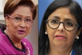 Prime Minister Kamla Persad-Bissessar (left) and Acting President of Venezuela, Delcy Rodriquez (CMC File Photo)