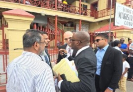 The Mohameds and their lawyers outside the Georgetown Magistrates’ Court on Thursday
