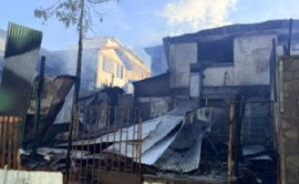 Buildings destroyed by fire last week in Roseau (CMC File Photo)