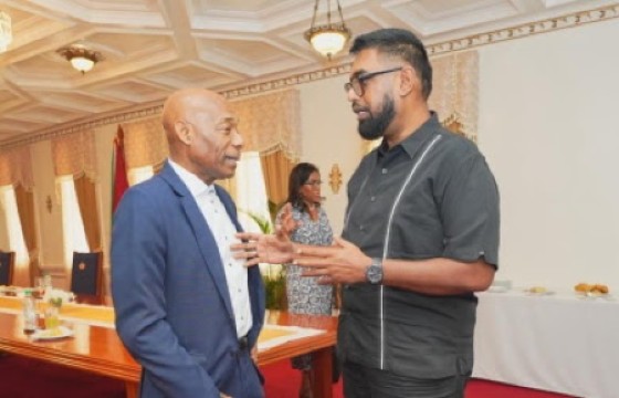 President Dr. Irfaan Ali (right) speaking with CDB president Dr. Hyginus Leon on Saturday