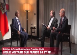 Head of Haiti’s Presidential Transitional Council (TPC), Leslie Voltaire, being interviewed on French television in Paris.