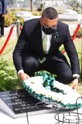 The Most Honourable Andrew Holness, Prime Minister lays a floral arrangement on the shrine of the Most Honourable Edward Seaga, former Prime Minister of Jamaica during a floral tribute to commemorate the 92nd Anniversary of his birth. The event was held on Seaga’s birthday, Saturday, May 28 at the National Heroes Park in Kingston.