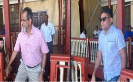 Opposition Leader, Azruddin Mohamed (with shades) and his businessman father, Nazar “Shell” Mohamed (File Photo)