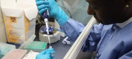 A training session on coronavirus testing takes place at the Best-dos Santos Public Health Laboratory in Barbados in 2020. (Photo courtesy of PAHO Barbados/Brenda Lashley)