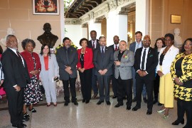 Jamaica's Ambassador to the United States and Permanent representative to the Organization of American States, Her Excellency Audrey Marks (center) and OAS Assistant Secretary General Ambassador Nesta Mendez 4th from right pause for photographs with members of the permanent council of the OAS following ceremony at the Organization of American States in Washington DC on Monday March18, at the 7th Inter-American Week for People of African Descent. (Photo by Derrick Scott)