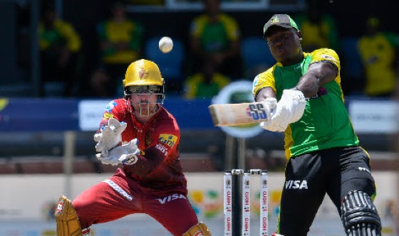 Rovman Powell hits out during his half-century against TKR on Saturday. (Photo courtesy Getty/CPL)