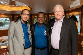 Ken Roland (center), 2020 Education Achiever, celebrated this honor with his son Jacob Roland (L) and Colin Brown (R), chairman of the board, JM Family Enterprises