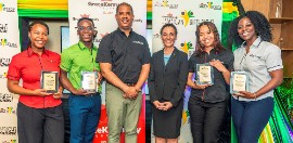From left to right:- Birthright Interns Kyrah Mcintosh, Josiah Royes, GraceKennedy Group CEO Frank James, Minister of Foreign Affairs and Foreign Trade The Honourable Kamina Johnson Smith, and Interns Lauren Roach and Abigail Ralph.