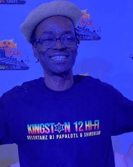 Shinehead captured on the Welcome to Jamrock Reggae Cruise, donning a Kingston 12 Hi Fi tee. (Photo Credit: @reggaebabi)
