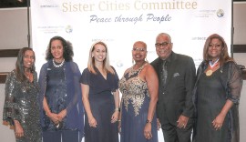 Chair of the Atlanta-Montego Bay Sister Cities Committee is flanked (from left) by President of the Atlanta Jamaica Association, The Rev. Dr. Maxine Foster, Mrs. Hazel Martin, Global Engagement Manager for the Mayor of Atlanta’s Office of International and Immigrant Affairs, Meredith Steinmetz-Rodriguez, Dr. Dwight Blaick and Jamaica’s Honorary Consul to Atlanta Dr. Elaine Bryan. They all shared lens at the Atlanta-Montego Bay Sister Committee “Dance for Health” fundraiser held Saturday September 24, 2022 at the Atlanta Airport Marriott Gateway Hotel. (Photo by Derrick Scott)