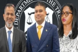 Mae Thomas (right) alongside Nazar Mohamed and his son, Azruddin Mohamed.