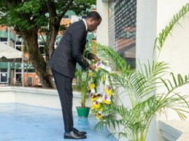 Minister of Foreign Affairs and International Cooperation, Hugh Todd laying a wreath on the 48th anniversary of the Cubana Air Disaster