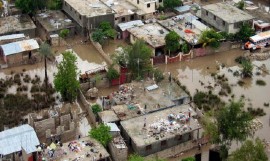 Much of the area around the city of Gonaives was in floodwaters and covered by mud after Tropical Storm Jeanne tore through Haiti. (UN Photo)