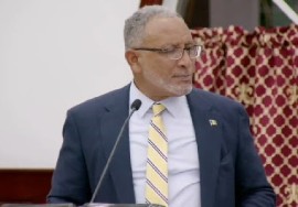 Prime Minister and Minister of Finance Dr. Godwin Friday