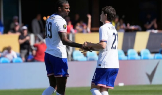 United States forward Haji Wright (left) is congratulated by midfielder Paxten Aaronson after scoring against Trinidad and Tobago.