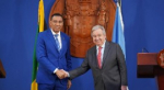 Secretary-General António Guterres (right) and Prime Minister Andrew Holness of Jamaica shake hands prior to their press conference in Kingston, Jamaica. (UN Photo/Jermaine Duncan)